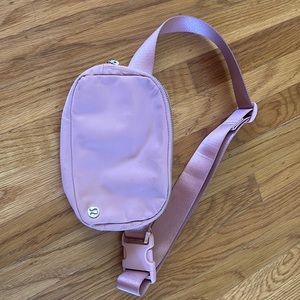 Lululemon belt bag in pastel pink